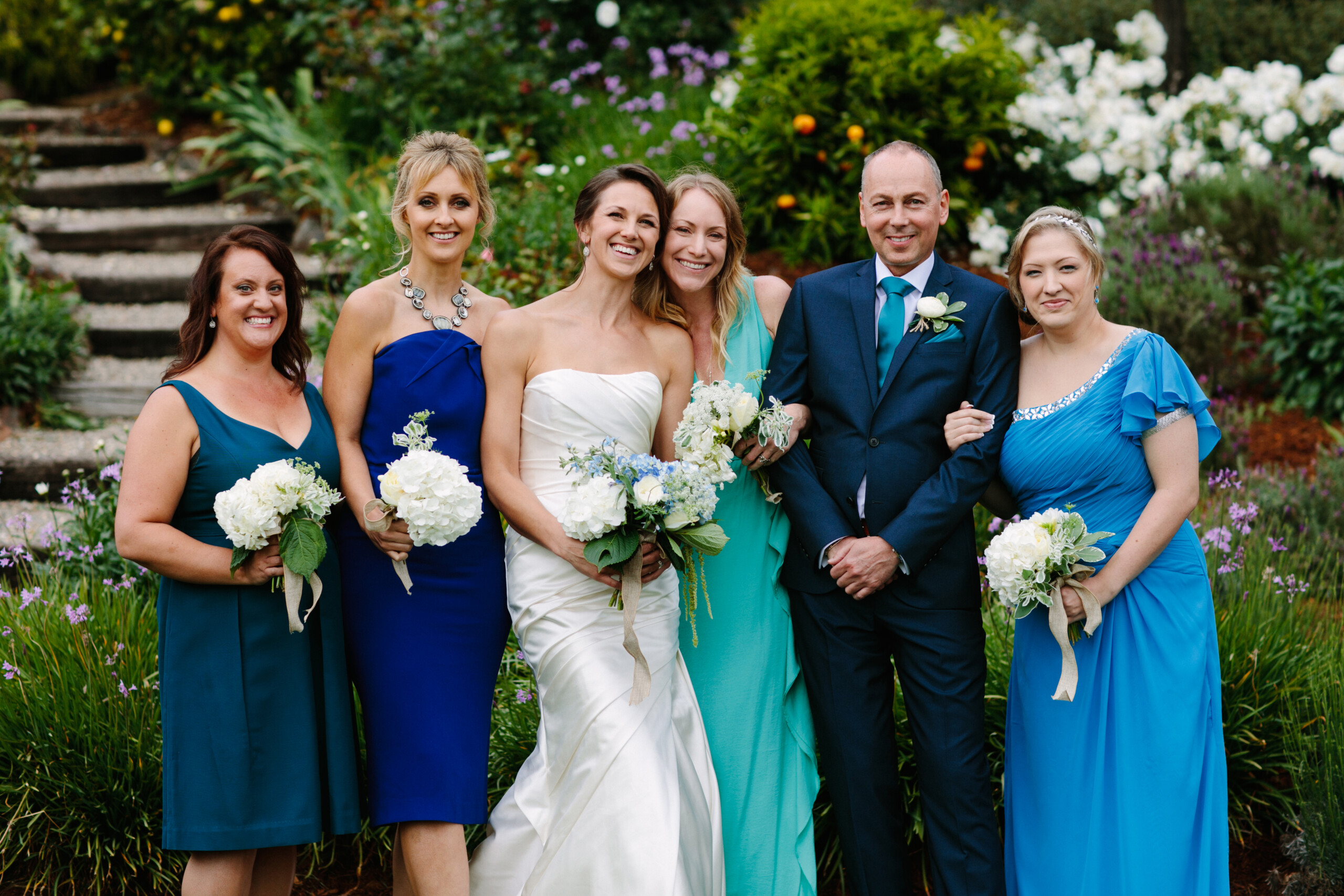 Sandra's bridal party, including 4 bridesmaids and 1 bridesman.