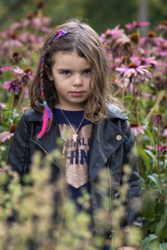 Young girl looking intensely into the camera.